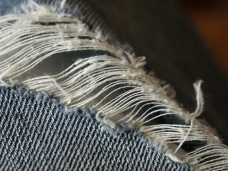 Distressed denim jeans
